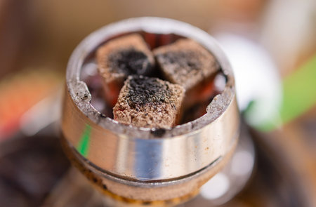 hookah hot coals for smoking and leisure in natural lighting.