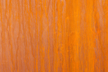 texture of rusty iron, cracked paint on an old metallic surface, sheet of rusty metal with cracked...