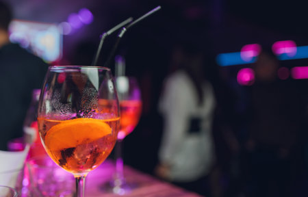 Several glasses of famous cocktail Martini, shot at a bar with shallow depth of field.の写真素材