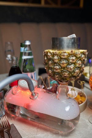 Stylish hookah with the aroma pineapple for relax.Pineapple shisha.Hookah lounge.の写真素材