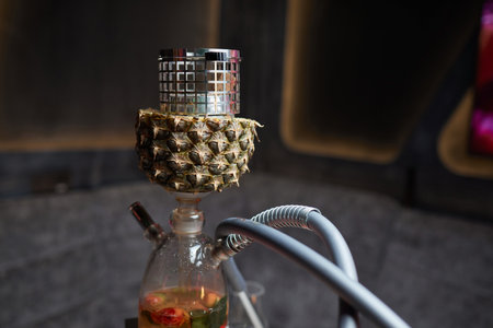 Stylish hookah with the aroma pineapple for relax.Pineapple shisha.Hookah lounge.の写真素材