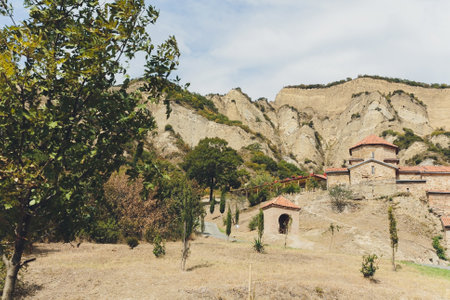 Ancient Shio-Mgvime Monastery is located in a narrow limestone gorge high in the mountains in Mtskheta, Georgia.の写真素材