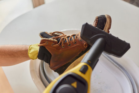 washing the dirty cleaning the shoes with a steam cleaner.の写真素材