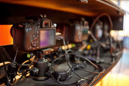 Camera connected to laptop with usb cable. File transfer to computer from DSLR. Back up storage for...