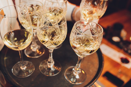 Refreshing White Wine in a Glass on a Background.の写真素材