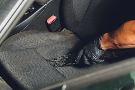 Car interior textile seats chemical cleaning with professionally extraction method. Early spring cleaning or regular clean up.の写真素材
