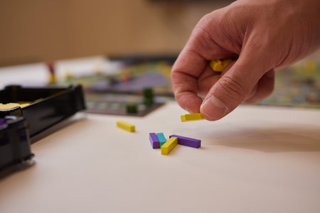 Hand playing board game, strategy concept. close-up