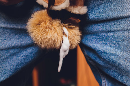 Hands cleaning mens camel suede desert shoe boot with a brush. sex concept.の写真素材
