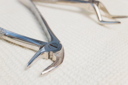 Set of metallic dentist tools. Dentist choses metal head for dentist s drill. Dentist clinic.の写真素材
