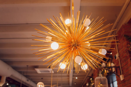 Beautiful chandelier. Modern chandelier hanging under ceiling.の写真素材