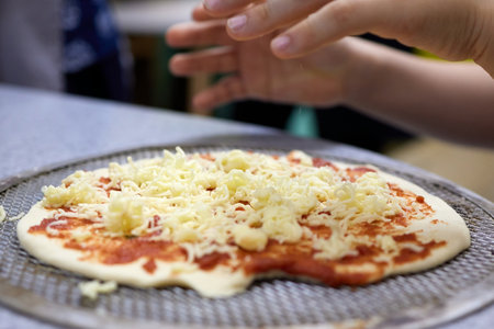 Pizza baking master class for children. Childrens birthday.の写真素材