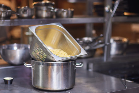 Close up view of pasta noodles or Spaghetti in a food container after being boils on a table.の写真素材