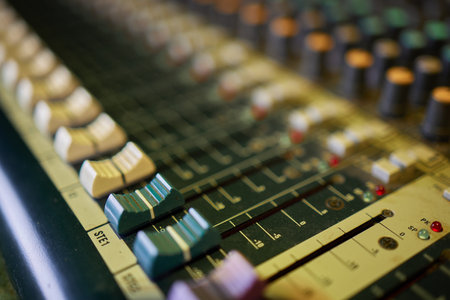 View of music mixer in concert, filled with lights.の写真素材