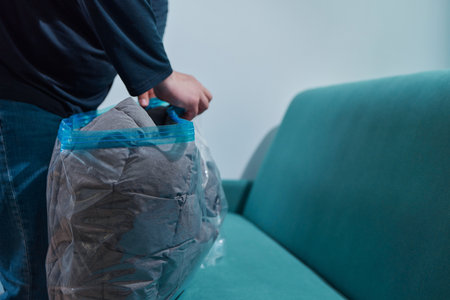 Space saver saving seal bag sucking air vacuum clothing storage compressed package.