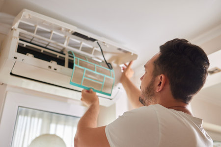 Dirty air conditioner filter need cleaning. Air conditioner service, repair and clean equipment.の写真素材