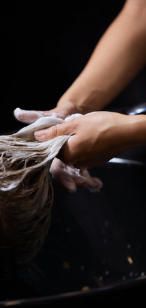Hairstylist Hairdresser Washing Customer Hair - Young Man Relaxing In Hairdressing Beauty Salon.の写真素材