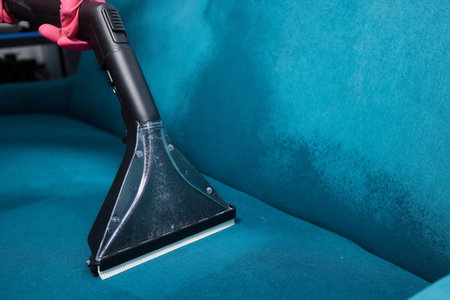 Dirty sofa chemical cleaning with professionally extraction method. Upholstered furniture. Early spring cleaning or regular clean up.の写真素材