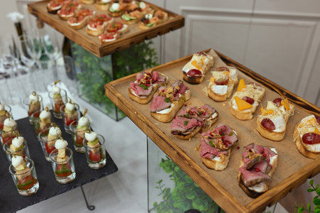 a lot of cold snacks on buffet table, catering.