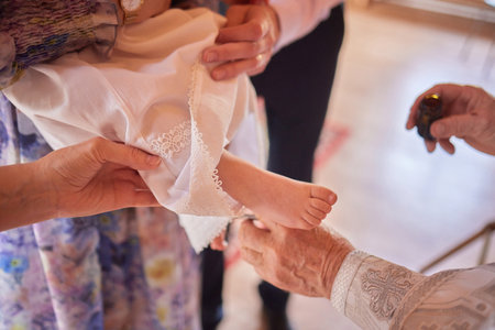 baby christening. Ceremony of a christening in Christian church. baptismal.の写真素材