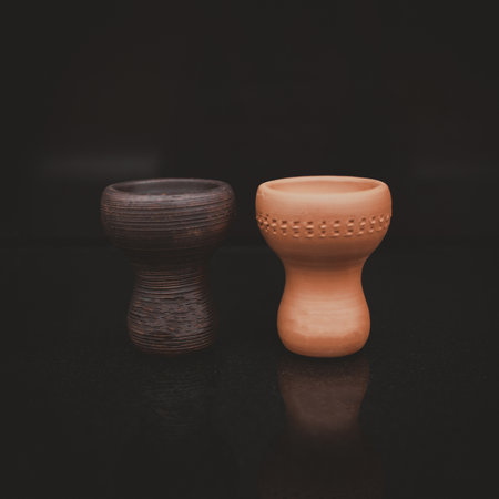 Hookah brown bowls isolated on black background.の写真素材