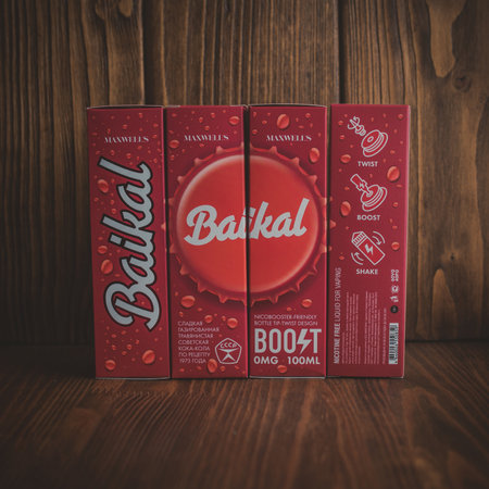 Ufa, Russia, Vape Shop, 1 July, 2019: E-liquid e-juice High vape for electronic cigarette vaping device , on counter in smoke vapor in vape bar in bottles.のeditorial素材