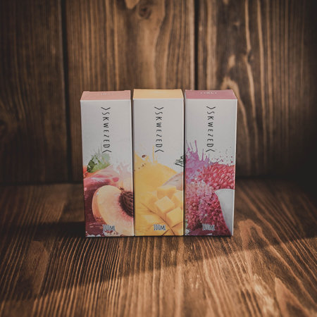 Ufa, Russia, Vape Shop, 1 July, 2019: E-liquid e-juice High vape for electronic cigarette vaping device , on counter in smoke vapor in vape bar in bottles.のeditorial素材