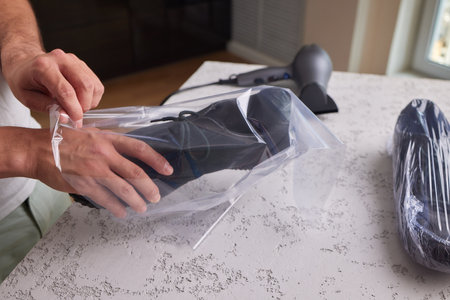 vacuum packing sneakers. for seasonal storage close-up.の写真素材