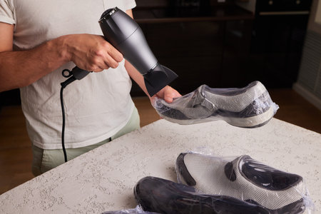 vacuum packing sneakers. for seasonal storage close-up.の写真素材