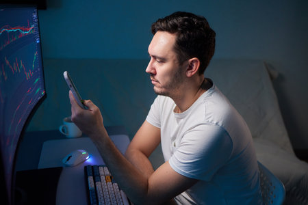 Crypto trader investor broker holding finger using cell phone app executing financial stock trade...