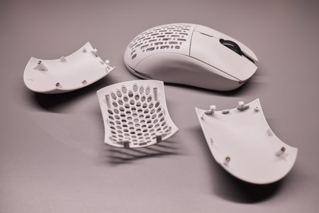 white new wireless computer mouse flat lay with led lightsの写真素材