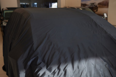 Car under the rag, car presentation, event, surpriseの写真素材