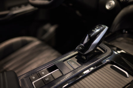 Selector automatic transmission with leather in the interior of a modern expensive car. The...