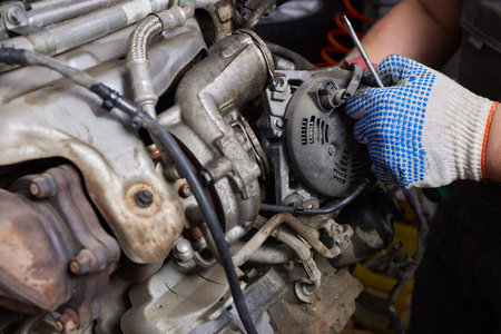 Engine valve car maintenance. The cylinder block of the four-cylinder engine. Disassembled motor vehicle for repair.の写真素材