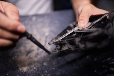 Cleaning a processor fan with a brush