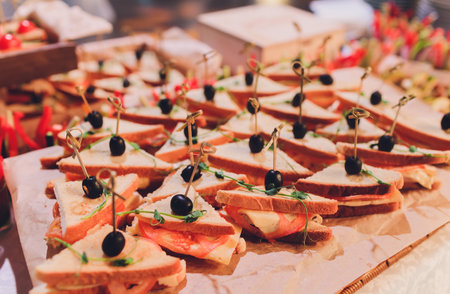 Fresh Assorted snacks of canape on the table.の写真素材