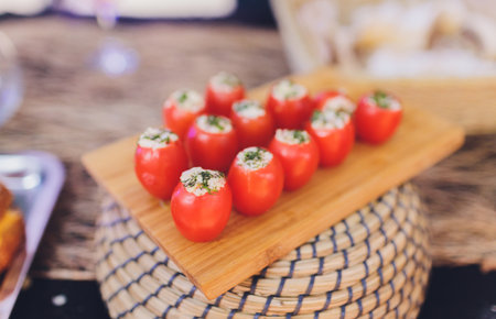 Salmon and caviar rolls served on a plate.