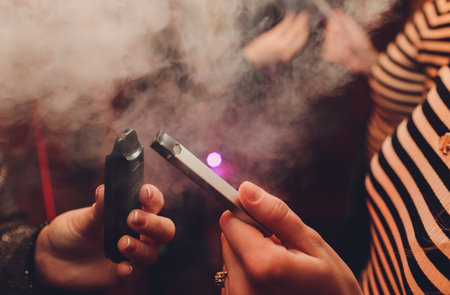 POD or ultra-portable systems vape is the newest Electronic cigarette technology.POD vape isolated...