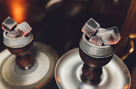 hookah hot coals for smoking and leisure in natural lighting.