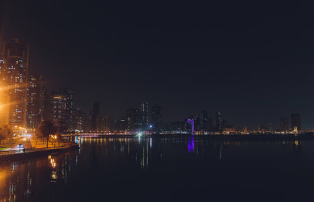 Sharjah, UAE, 18 October, 2019: Skyline of Sharjah City at night, United Arab Emirates.のeditorial素材