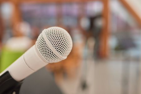 Make sure to arrange the microphone correctly in the event hall for speeches or performancesの写真素材