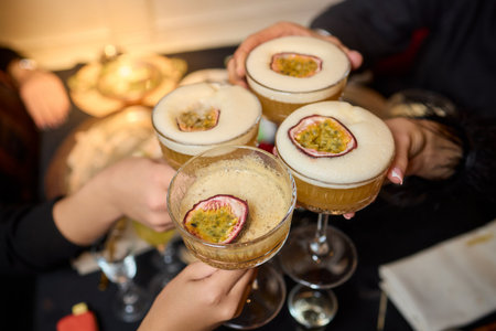 Cheers to Celebration Enjoying Elegant Cocktails That Make Every Toast Special and Memorableの写真素材