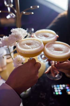 Cheers to Celebration Enjoying Elegant Cocktails That Make Every Toast Special and Memorableの写真素材