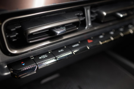 Closeup of car dashboard air vents near gear shiftの写真素材