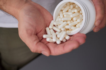 sport, healthy lifestyle, medicine, nutritional supplements and people conceptの写真素材