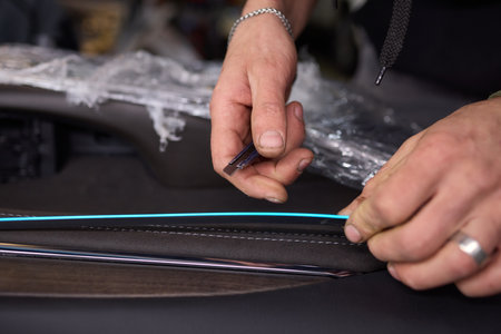 Car Lighting : Installing a led dry lamp in the driving room.の写真素材