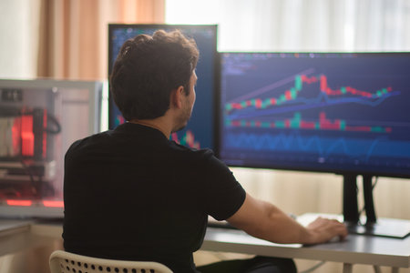 Intraday trader angry over loss in stock market investment while trading - concept showing risk of investing in cryptocurrency and millennial people losing in equitiesの写真素材