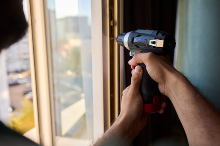 Home Improvement Installing a Window with the Use of Power Tools for Better Efficiencyの写真素材