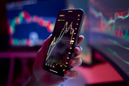 Carefully Analyzing Stock Trends Effectively on Both Mobile and Desktop Displays for Insightsの写真素材