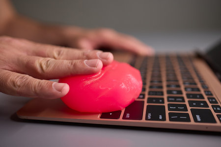 Clean your keyboard easily with a gel cleaner, an efficient solution for a dustfree workspace
