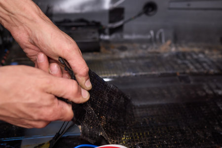 Tunning service worker install soundproofing material inside car interiorの写真素材